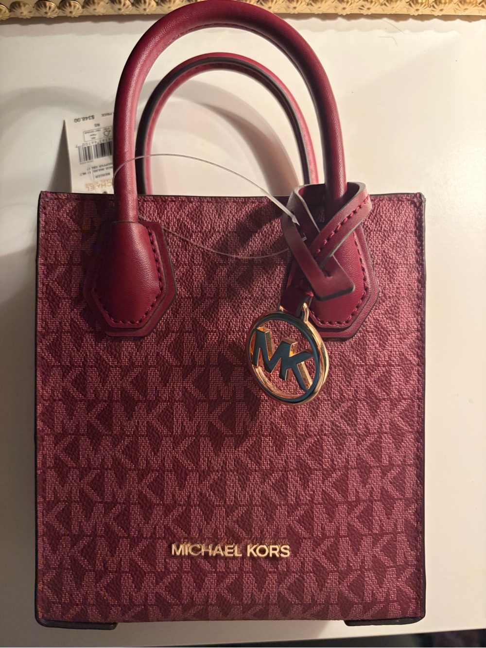 Michael Kors Burgundy Monogram Mini Tote with Gold MK Charm